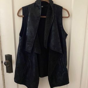 Faux leather fleece lined vest